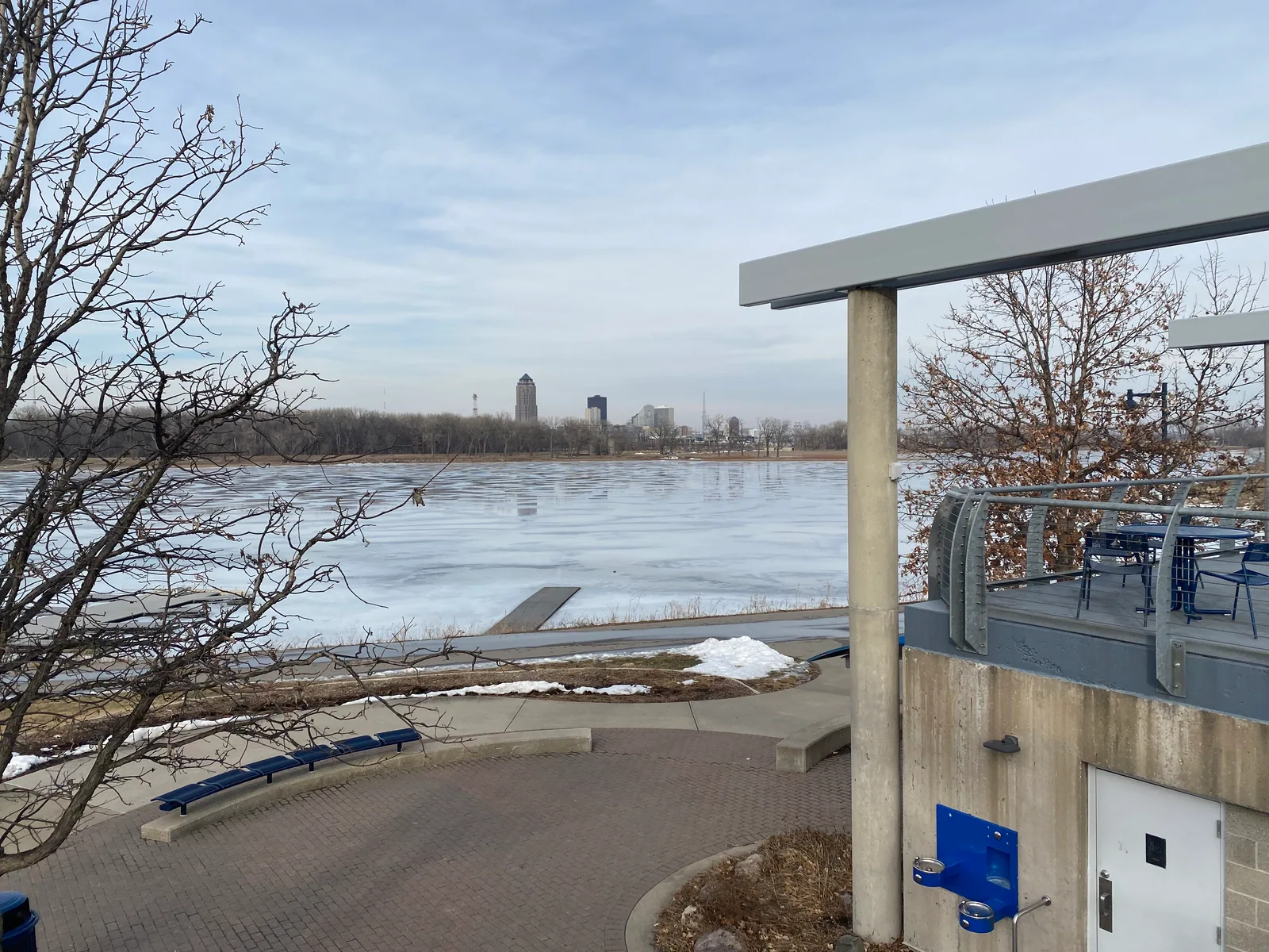 Snow-covered winter landscape at Gray’s Lake Park in Des Moines