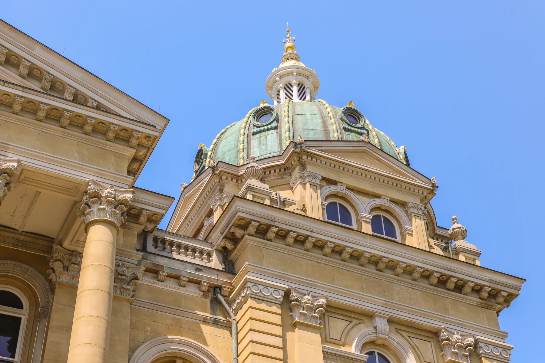 Gold-domed Iowa State Capitol and grounds in Des Moines